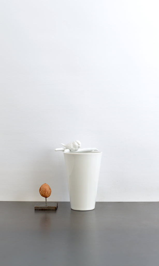 Bird on branch vase