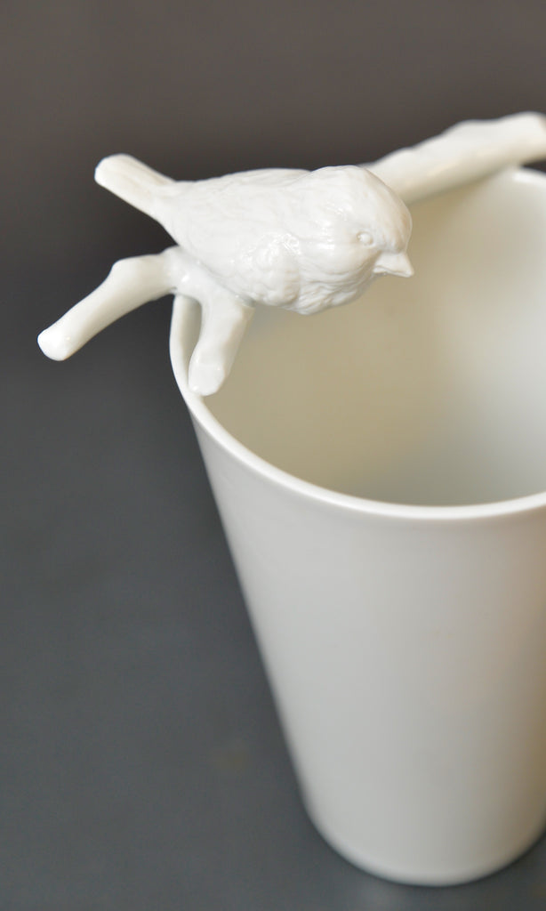 Bird on branch vase