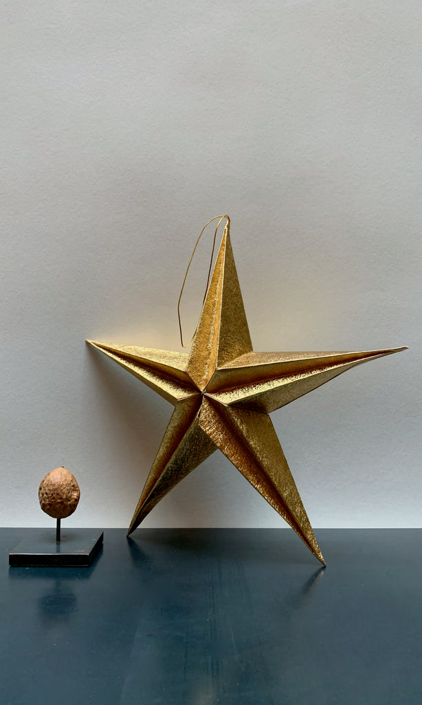 Golden paper folding star tree decoration