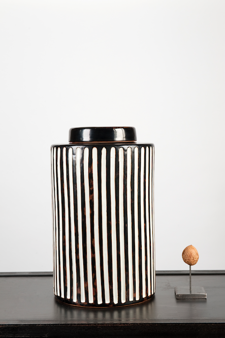 Striped black and white pot