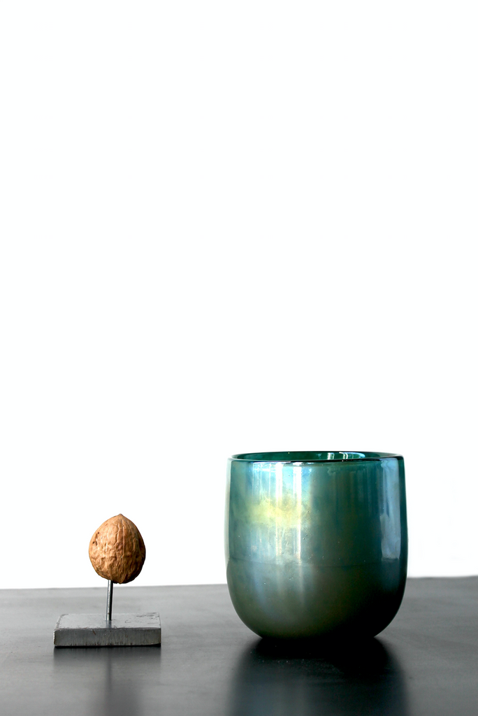 Small green vase with pearl glow